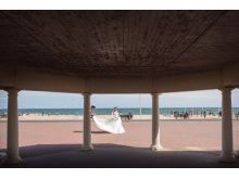 Wedding photograph of bride on beach in Sandbanks, Dorset